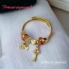 Pulsera charms acero inoxidable llave piedra roja